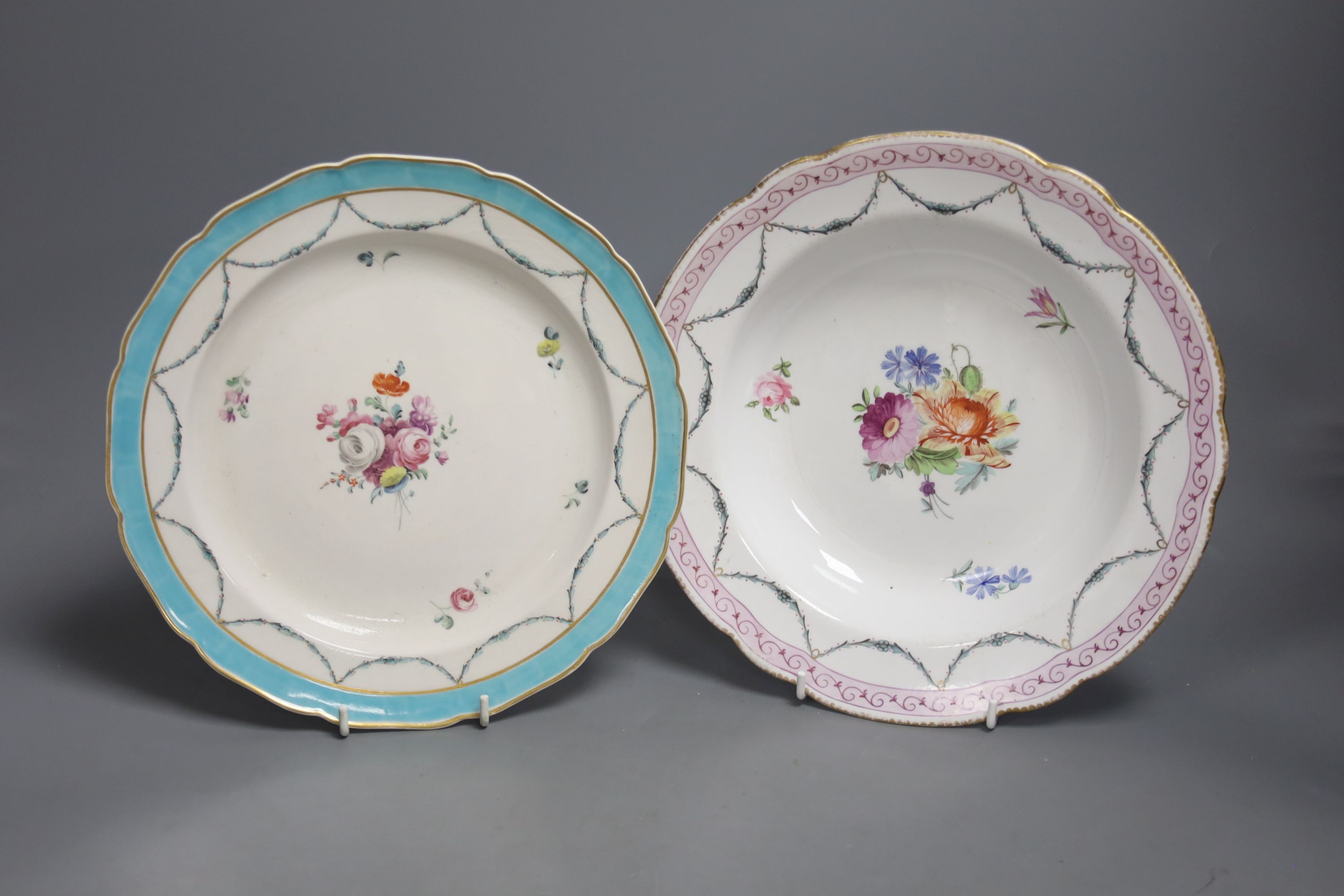A Chelsea Derby plate painted with central floral bouquet c.1778 and a Chelsea Derby soup plate c.1775, diameter 25cm